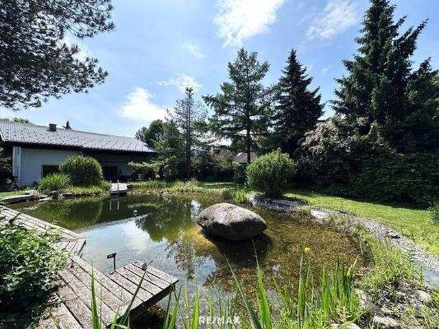 Immobilie in Bleiburg - Ein Ort der Ruhe und Eleganz - großzügiges Wohnen inmitten eines harmonischen Gartenparadieses mit Naturteich - Bild 1