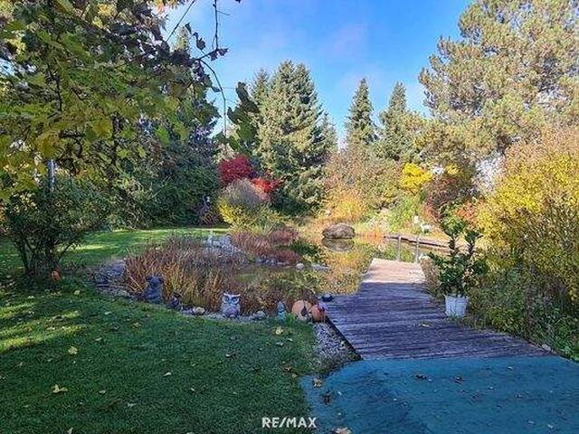 Immobilie in Bleiburg - Ein Ort der Ruhe und Eleganz - großzügiges Wohnen inmitten eines harmonischen Gartenparadieses mit Naturteich - Bild 4
