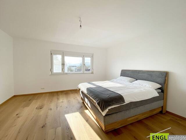 Immobilie in Maria-Lanzendorf - Hochwertig renovierte 3 Zimmerwohnung im modernen Design inclusive KFZ Stellplatz und attraktivem Gemeinschaftsgarten - Bild 0