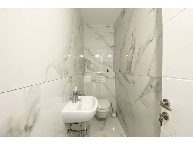 Immobilie in Maria-Lanzendorf - Hochwertig renovierte 3 Zimmerwohnung im modernen Design inclusive KFZ Stellplatz und attraktivem Gemeinschaftsgarten - Bild 4