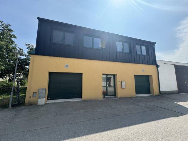 Immobilie in Michelhausen - Miethaus mit 2 neuwertigen Wohnungen im OG und 2 großen Garagen sowie Abstellräumen ebenerdig - Bild 0