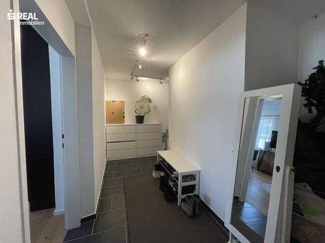 Immobilie in Grödig - Helle 3-Zimmer-Wohnung mit hochwertiger Einbauküche und Balkon - Bild 2