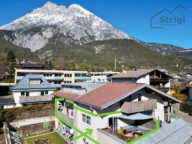 Immobilie in Telfs - Großzügige 2-Zimmer-Terrassenwohnung mit Südterrasse, Balkon & Garten in Telfs - Bild 1
