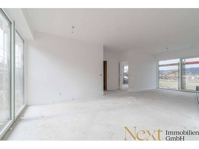 Immobilie in Wilhering - ERSTBEZUG! Traumhafte 4-Zimmer-Wohnung mit herrlichem Donaublick mit Eigengarten & Terrasse zu verkaufen! - Bild 2