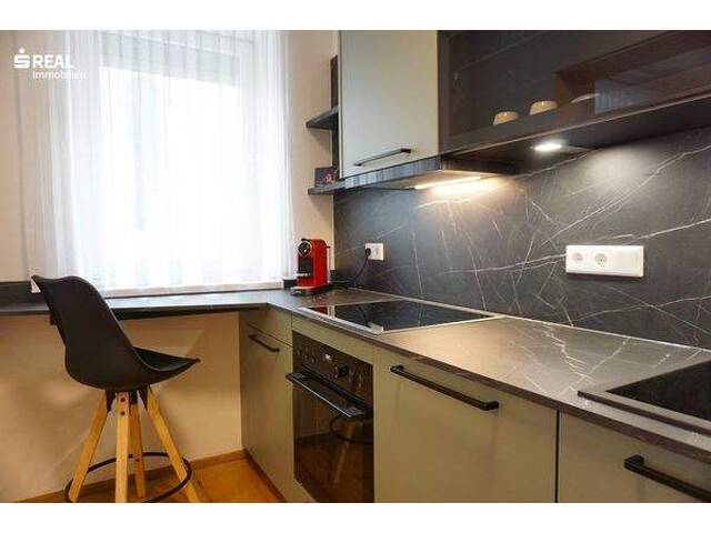 Immobilie in Oberndorf bei Salzburg - Neuwertige 2-Zimmer-Wohnung in Oberndorf bei Salzburg - Bild 1