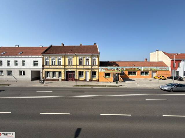 Immobilie in Neunkirchen - Zinshausähnliche Liegenschaft mit Geschäftslokal und 3 Wohnungen - Bild 1