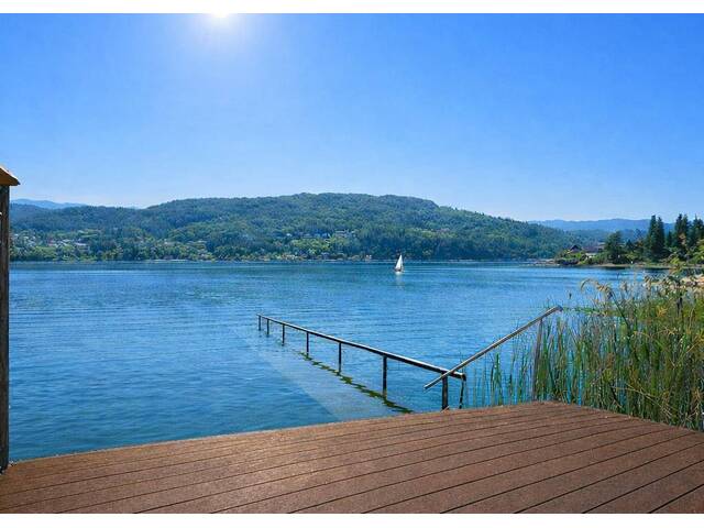Immobilie in Krumpendorf - Gepflegtes Appartementhaus direkt am Wörthersee inklusive Panoramaseeblick sowie Badesteg und Bootsunterstand - Bild 1