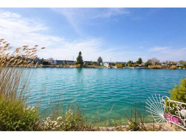Immobilie in Himberg - WOHNEN AM SEE, ERBAUEN SIE SICH IHREN WOHNTRAUM MIT SEEZUGANG, Renovierungsbedürftige Doppelhaushälfte - Bild 0