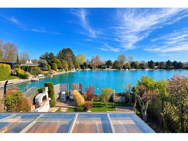 Immobilie in Himberg - WOHNEN AM SEE, ERBAUEN SIE SICH IHREN WOHNTRAUM MIT SEEZUGANG- Haus mit Keller in Trockenparzelle - Bild 2