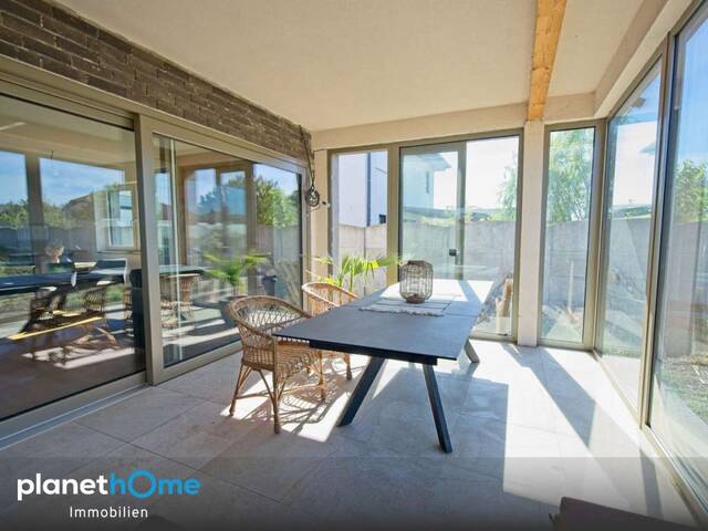 Immobilie in Frauenkirchen - Charmanter Bungalow in Frauenkirchen – mit beheiztem Wintergarten & Kamin - Bild 0