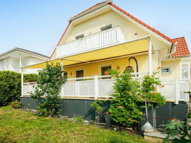 Immobilie in Wimpassing an der Leitha - Urlaubsfeeling inklusive! Modernes Einfamilienhaus mit Balkon, Terrasse und Garten in Gated Community mit idyllischem Badesee - Bild 0