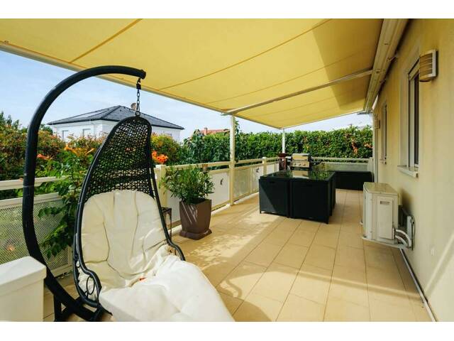 Immobilie in Wimpassing an der Leitha - Urlaubsfeeling inklusive! Modernes Einfamilienhaus mit Balkon, Terrasse und Garten in Gated Community mit idyllischem Badesee - Bild 1