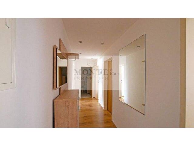 Immobilie in St. Johann in Tirol - Charmante 3-Zimmer-Wohnung mit Balkonblick auf das Kitzbüheler Horn - Bild 1