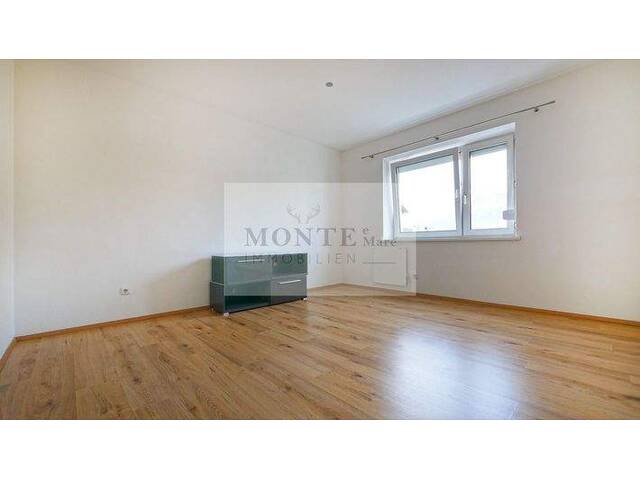 Immobilie in St. Johann in Tirol - Charmante 3-Zimmer-Wohnung mit Balkonblick auf das Kitzbüheler Horn - Bild 2