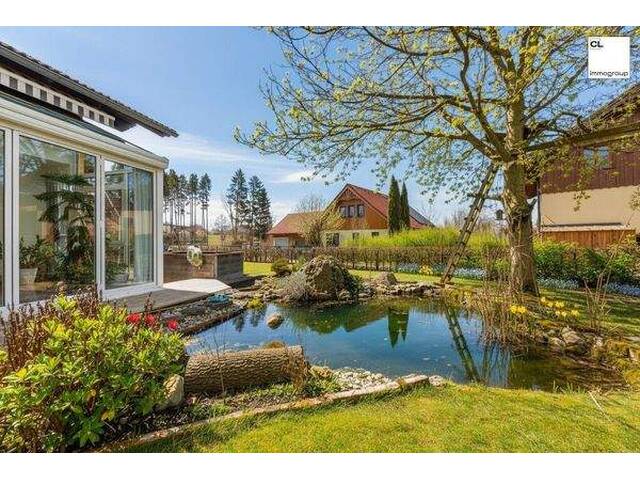 Immobilie in Moosdorf - Sehr gepflegtes Familienhaus mit Pool, Fischteich und neuem Pelletssystem - großer Garten - Bild 1