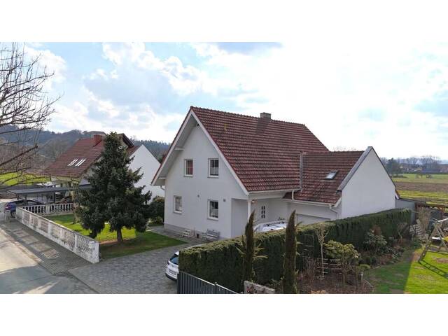 Immobilie in Mureck - Großzügiges Einfamilienhaus mit Garten, Terrasse & zusätzlichem Raum über der Garage in ruhiger Lage in MURECK! - Bild 1