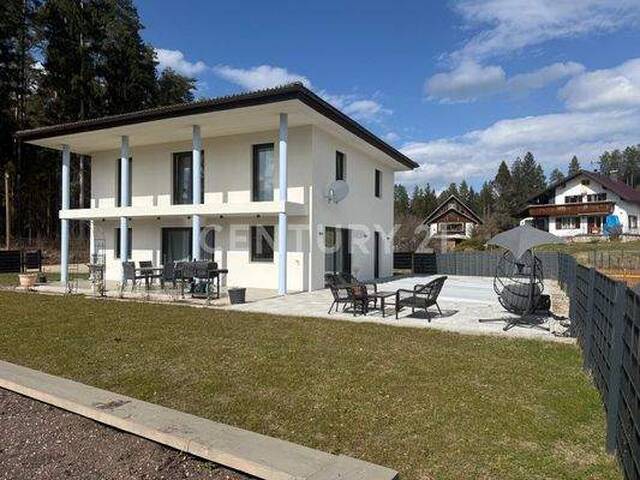 Immobilie in Rosegg - C21 - Modern Living nahe Velden am Wörthersee - Pool, Garten & Luxusdetails - Bild 1