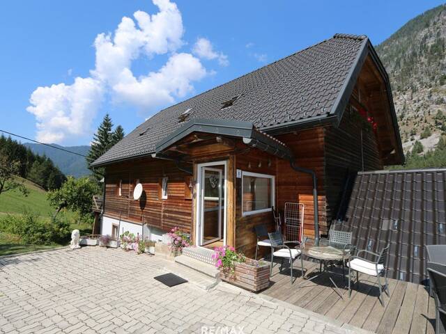 Immobilie in Bleiberg-Kreuth - chaletartige Wohnung mit riesigem Garten, beinahe ein ganzes Haus - Bild 0