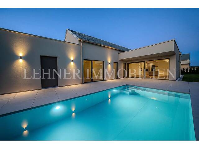 Immobilie in Wundschuh - * WUNDSCHUH * STILVOLLER BUNGALOW MIT SALZWASSERPOOL - OPTIMALE RAUMAUFTEILUNG UND EDLE AUSSTATTUNG - Bild 0