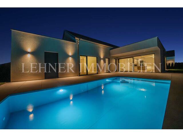 Immobilie in Wundschuh - * WUNDSCHUH * STILVOLLER BUNGALOW MIT SALZWASSERPOOL - OPTIMALE RAUMAUFTEILUNG UND EDLE AUSSTATTUNG - Bild 1