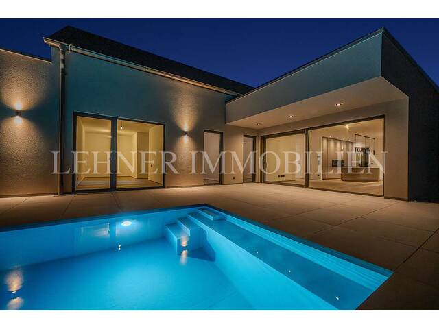 Immobilie in Wundschuh - * WUNDSCHUH * STILVOLLER BUNGALOW MIT SALZWASSERPOOL - OPTIMALE RAUMAUFTEILUNG UND EDLE AUSSTATTUNG - Bild 2