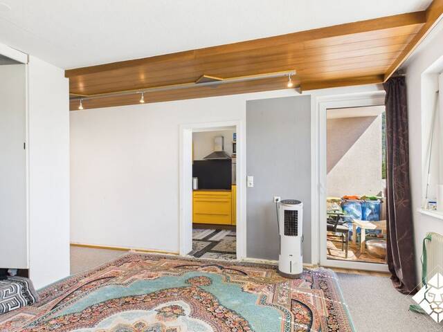 Immobilie in Wörgl - Teilsanierte 1,5-Zimmer-Wohnung mit attraktivem Entwicklungspotenzial in zentraler Lage zu kaufen! - Bild 2