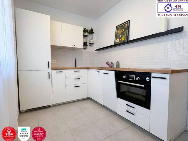 Immobilie in Wolkersdorf im Weinviertel - Dein Platz im Grünen - 2 Zimmer, Terrasse, Parkplatz, Schlosspark Wolkersdorf - Bild 2