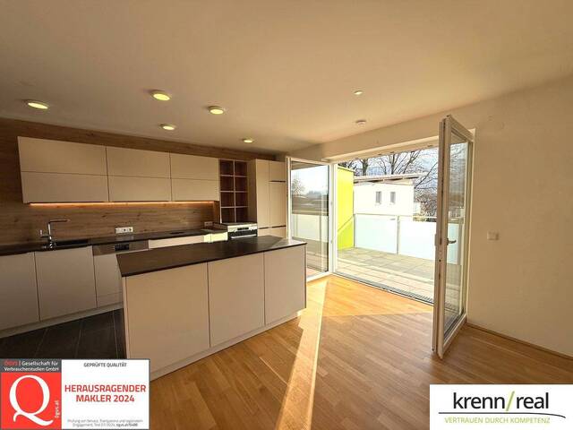 Immobilie in Aurach am Hongar - Einziehen und Wohlfühlen - moderne Wohnung mit großem Balkon und TG-Platz - Bild 0