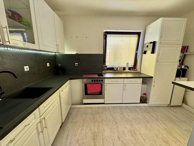 Immobilie in Braunau am Inn - Attraktives Zweifamilienhaus mit zwei vermieteten Wohnungen und neuer Luftwärmepumpe - Bild 4