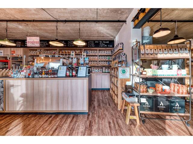 Immobilie in Telfs - Traditionelles Haus mit mehreren Wohneinheiten, Caférösterei und Hofladen in Bestlage von Telfs ! - Bild 4