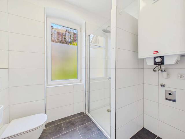 Immobilie in Gmunden - Hochwertig renovierte 2-Zimmer-Wohnung mit privatem Eigengarten, Traunnähe & Top-Lage in Gmunden - Bild 3