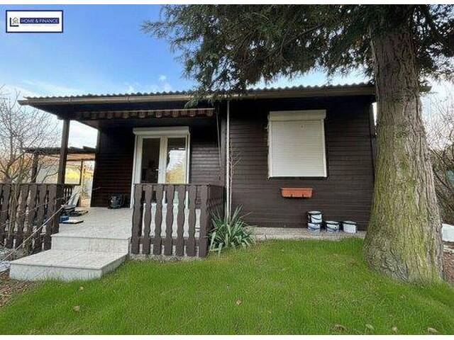 Immobilie in Steinbrunn - bezugsfertiger Ferientraum Direkt am See für 2 ! - Bild 1