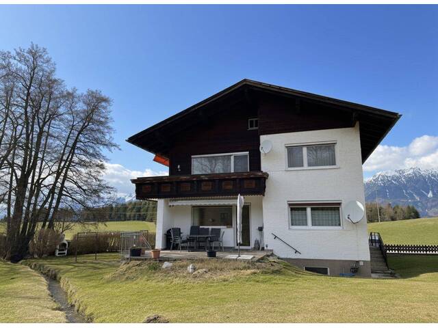 Immobilie in Rinn - Idyllische 2,5 Zimmer-Haushälfte mit großem Garten & Terrasse - Bild 1