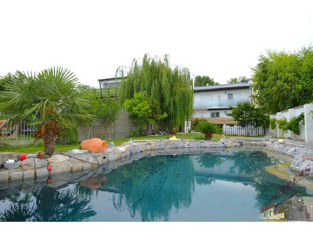 Immobilie in Podersdorf am See - Teilvermietetes Anlageobjekt/Mehrfamilienhaus - SANIERT - 6 Wohneinheiten - 137,53 m² Garage - ERSTE SEEREIHE - Bild 0