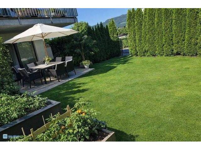 Immobilie in Taxach - Gartenparadies mit Untersbergblick - Schicke 3-Zimmer-Eckwohnung in Rif - Bild 0