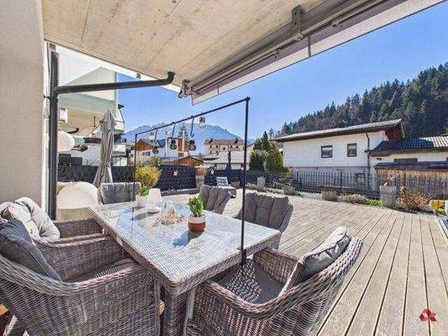 Immobilie in Niederndorf - Familienfreundliche Terrassenwohnung mit 2 Tiefgaragenstellplätzen in Niederndorf zu verkaufen - Bild 0