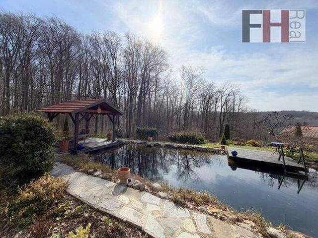 Immobilie in Riederberg - Gediegenes Einfamilienhaus mit herrlichem Garten und Schwimmteich in absoluter Ruhelage! - Bild 1