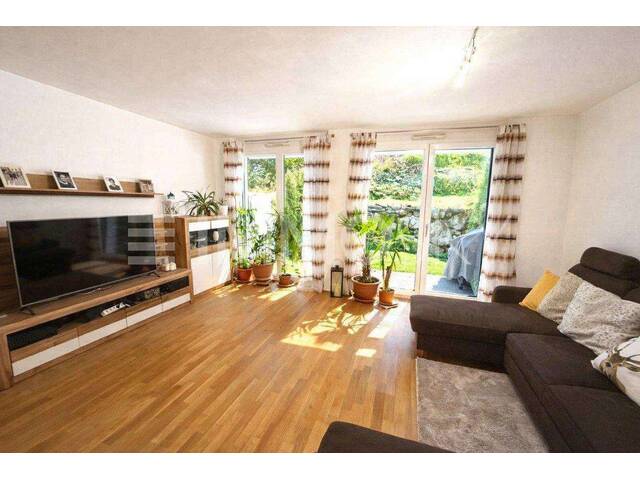 Immobilie in Henndorf am Wallersee - Familienfreundliche Maisonette im Reihenhausstil in begehrter Lage - Bild 1