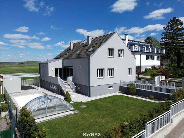 Immobilie in Bisamberg - Ihr Traumhaus: 211 m² Einfamilienhaus mit Pool & Weingartenblick in Bisamberg - Bild 0