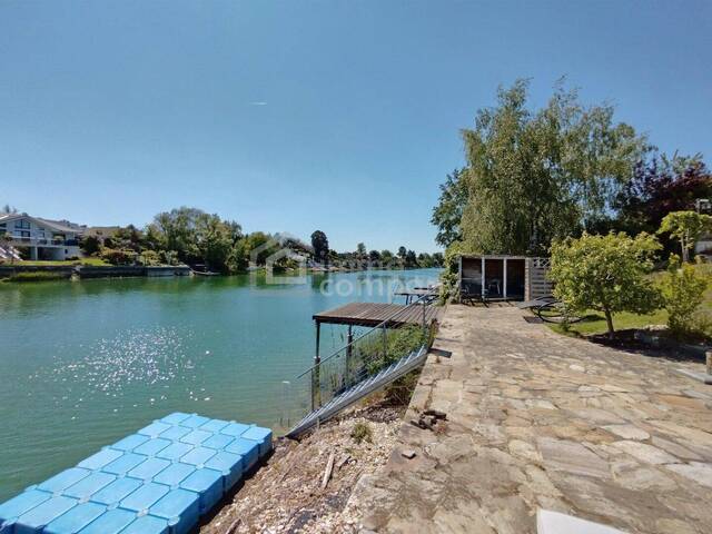 Immobilie in Groß-Enzersdorf - Seeliegenschaft leistbar gemacht: Haus am Wasser mit Traumterrasse u0026 eigenem Steg - Bild 3