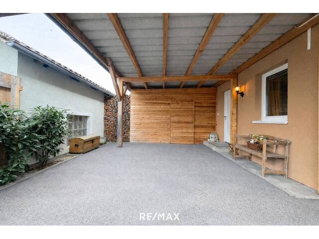 Immobilie in Hartkirchen - Ihr kleines Wohnparadies: Neuwertiger Bungalow mit Garten und Carport - Bild 1