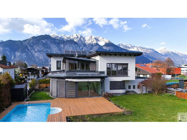 Immobilie in Götzens - Exklusives Einfamilienhaus mit Einliegerwohnung, beheiztem Pool & herausragendem Energiekonzept - Bild 0