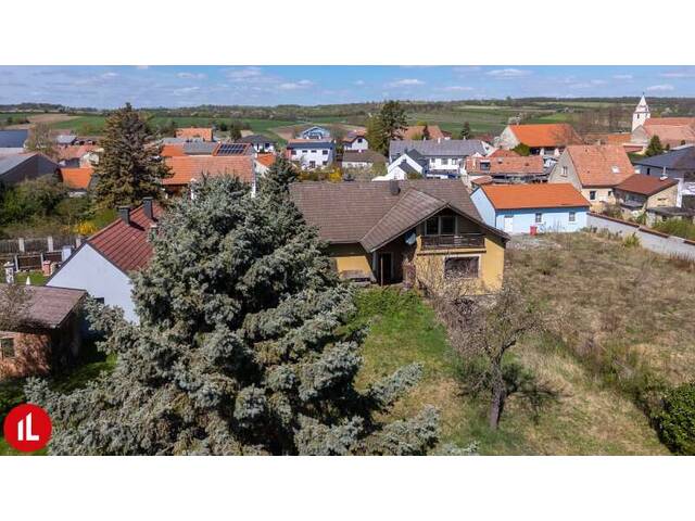Immobilie in Ebergassing - Großzügiges Grundstück (1.845 m²) mit Bestandshaus | Ruhe, Grünlage & Entwicklungspotenzial - Bild 1