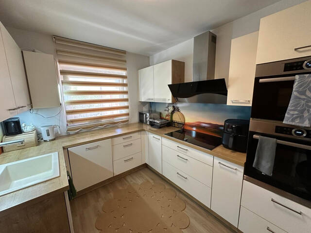 Immobilie in Kolsass - RUHE, LICHT & AUSSICHT ? STILVOLLE WOHNUNG MIT GARTEN UND BALKON - Bild 1