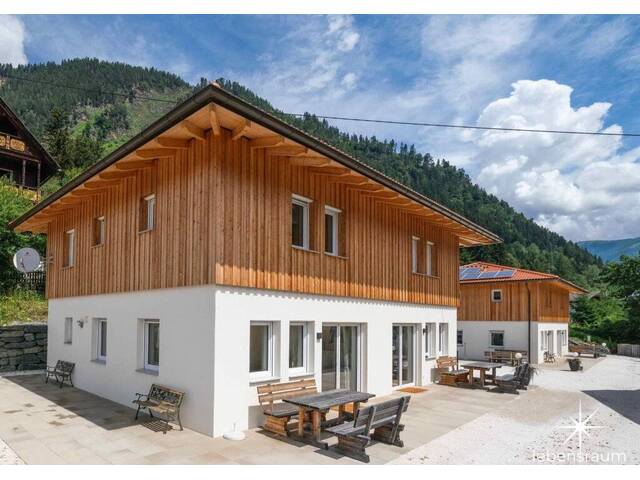 Immobilie in Döbriach - Etabliertes Ferienhaus-Ensemble am Millstätter See. Zwei moderne Häuser mit bestehender Vermietung. Investment. - Bild 0