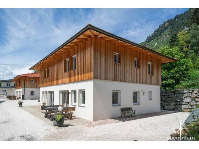 Immobilie in Döbriach - Etabliertes Ferienhaus-Ensemble am Millstätter See. Zwei moderne Häuser mit bestehender Vermietung. Investment. - Bild 1