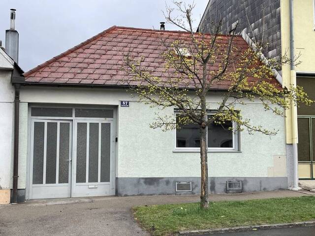 Immobilie in Müllendorf - GEPFLEGTES EINFAMILIEN-HAUS MIT GROSSER GARAGE/HALLE! - Bild 0