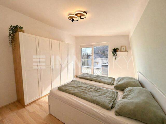 Immobilie in Moosdorf - Stilvolle Wohnung mit beeindruckender 65 m² Sonnenterrasse - Bild 1
