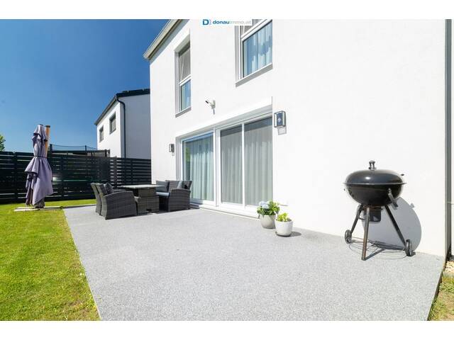 Immobilie in Bruck an der Leitha - Wohnen mit Qualität: Schlüsselfertiges Massivhaus mit Keller, Garten & Wärmepumpe - Bild 4