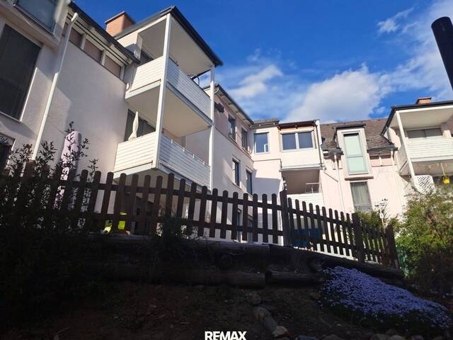 Immobilie in Mürzzuschlag - 4 Zimmer Wohnung 97 m² mit kleinem Garten und Sichtglas Kaminofen - Bild 2